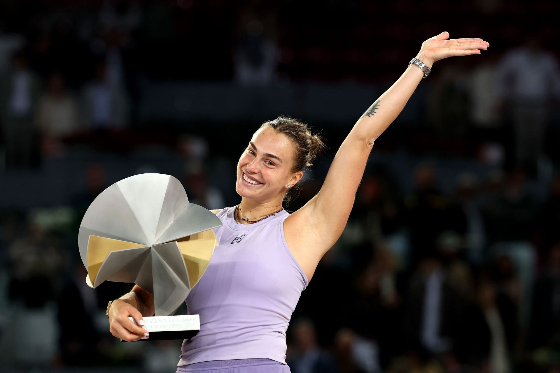 Aryna Sabalenka posing with her Mutua Madrid Open title trophy - Source: Getty